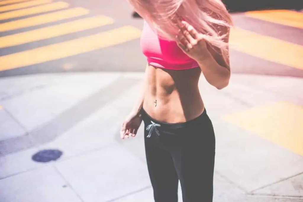 Woman with toned stomach after LA-EMS Body Sculpting Treatment Leicester